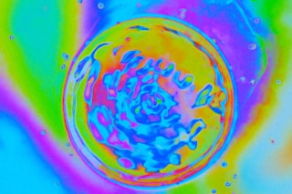 Vibrant abstract swirl in a colorful, psychedelic background.